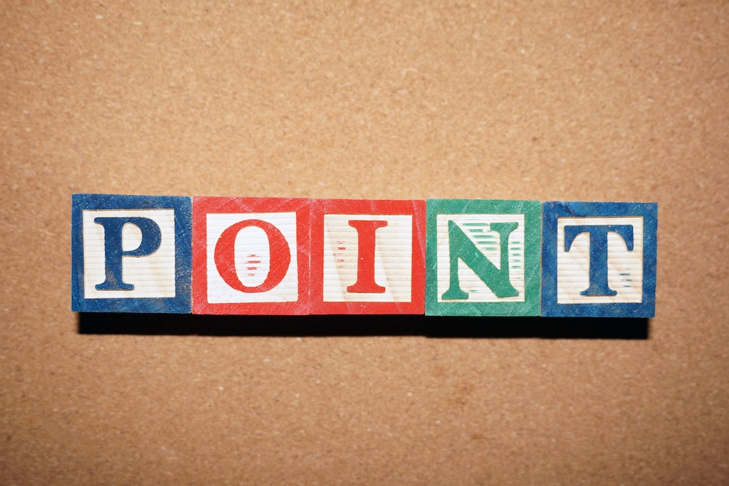 ざら紙で表現されたPOINTの文字