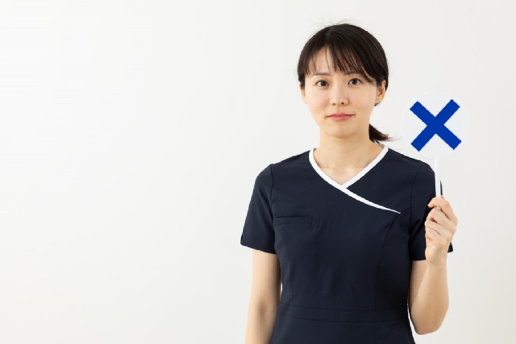 メッセージのNGを突きつける女性